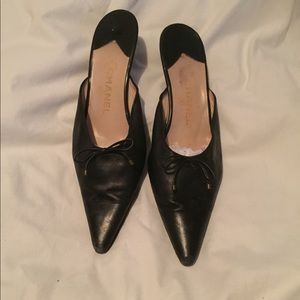 Black Chanel slip on mule.